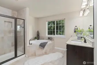 A spa-like 5-piece primary ensuite bath.