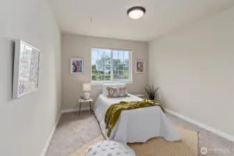 One of the 4 bedrooms located upstairs.