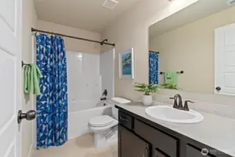 Full bathroom located upstairs.