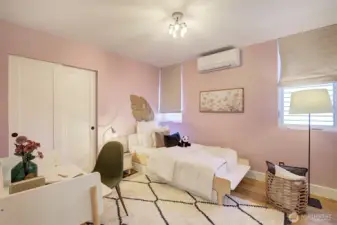 Upper level bedroom #1 with mini-split and built-in closet