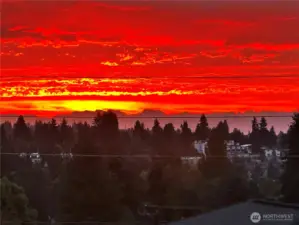 Cascade mountains at sunrise (view from upper floor patio) - picture taken by homeowner