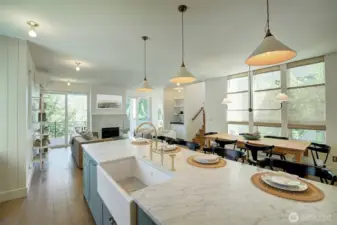 View of family room and entrance to main floor patio from the kitchen
