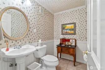 Main level powder room next to office