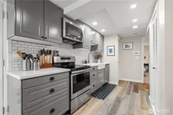 Full kitchen with stainless steel appliances