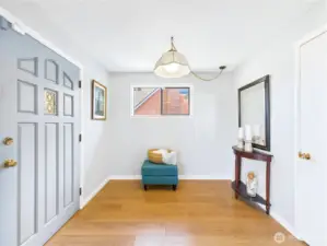 A solid wood front door welcomes you in to this beautiful home.