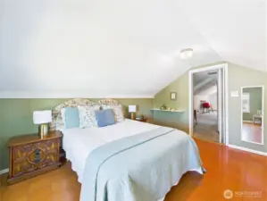 The upstairs has 2 bedrooms. This one is the larger of the two.