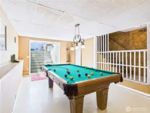 Although this is a basement, the large sliding doors makes it feel otherwise as lots of natural light is streaming in.