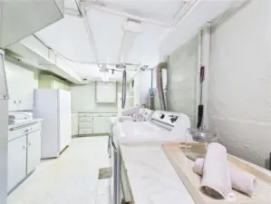 Lots of storage in the laundry/mechanical room. Washer and dryer conveys with home.