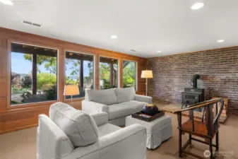 Lower level den/library with fireplace
