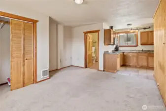 Overview of the bonus area looking at the 3/4 bath and kitchette area.