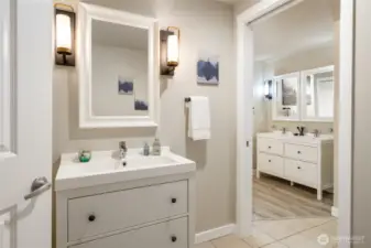 Handy half bath off of the hallways for guests.