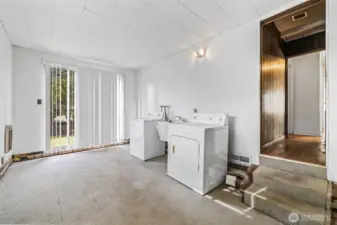 Bonus room with laundry—flex space for storage or expansion.