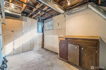 Utility room with additional storage space.