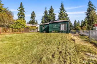 Wide view of lot showing open space and accessibility for new construction.