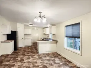 The kitchen is truly the hub of the home, offering easy access to the dining, living, and family rooms. A perfect layout for gathering, entertaining, or staying connected while you cook.