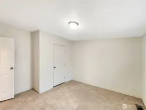 The secondary bedrooms feature ample closet space and plenty of natural light, providing both comfort and practicality. The luxury carpet will keep your feet warm.