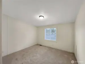 The second bedroom provides flexibility for guests, crafts, or work-from-home needs, with good storage, natural light and a cozy feel.
