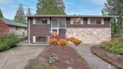 Mid-century modern home with a central, private entry tucked away from the lake and road