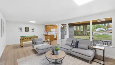 The ideal multipurpose lower level—movie nights, game time, or guest stays welcome.