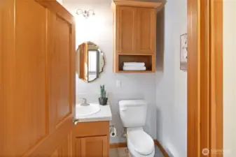 Convenient powder room with clean finishes, perfectly positioned on the main level.