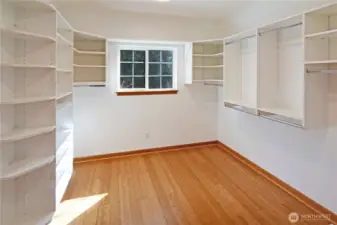 Generous primary suite with wide pathways, abundant light, and seamless connection to your dream walk-in closet. NO kidding, its the size of a bedroom. A window adds natural light and faces the backyard for privacy.