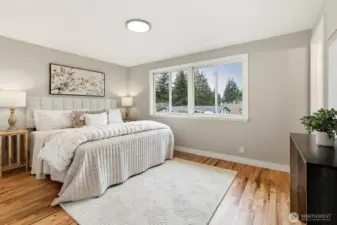 Primary suite with dual closets & ensuite bathroom.