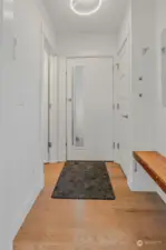 Entry with closet and bench