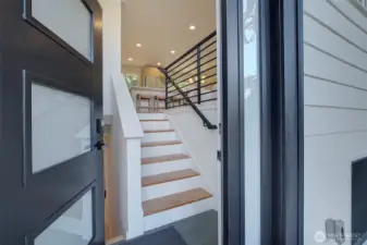 Welcome! New front door with electronic keypad and key for access and security.