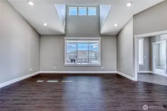 spacious living room w cathedral ceilings