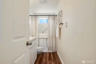 Upper unit with walk in tub.