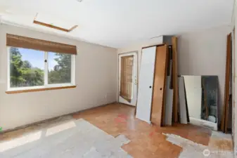 Primary seating area and door to private deck