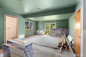 Downstairs family room with half bath and wet bar