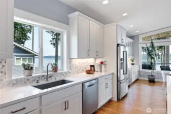 Quartz countertops with tile backsplash