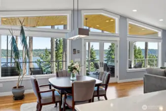 Wall of windows that open to your large deck