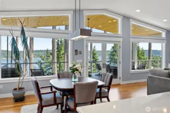 Wall of windows that open to your large deck