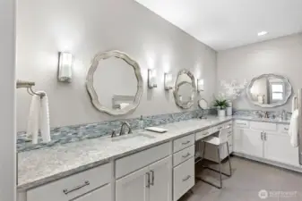 Primary bath with dual sinks, make up area and warming towel rack