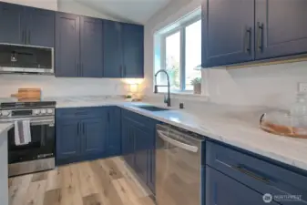 All stainless steel appliances included - self-cleaning oven, dishwasher, built-in microwave and refrigerator