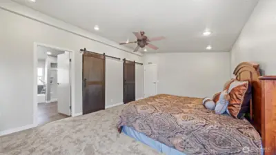Spacious primary retreat w/ brand new barn doors