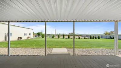 Covered patio designed for year-round outdoor living.