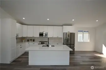 Space for dining table + casual bar seating.