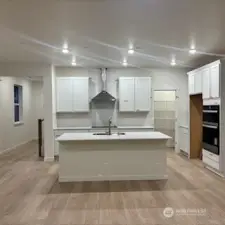 Gourmet kitchen with full-height backsplash!