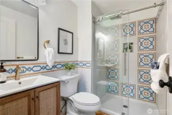 Main floor 3/4 bathroom with designer tiles