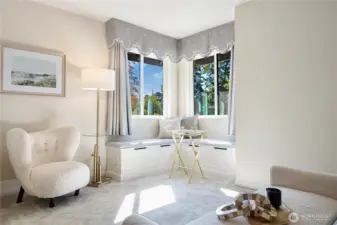 Light-filled sitting area in master bedroom