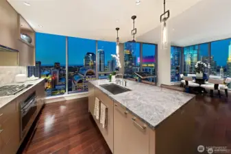 designer kitchen, gas cooking, custom light fixtures, tons of storage