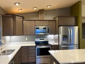 Beautiful stainless steel cabinets.