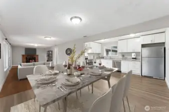 * Virtually staged- Kitchen and great room on the 1-story side of home. Office room is to the left of fireplace.