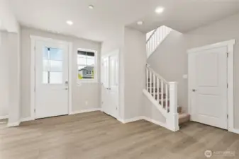 Entry flooded with light. Photo's are for representational purposes only. Colors and finishes may differ.