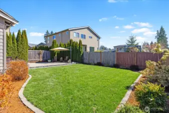 Fully fenced, mature landscaping and next to open space