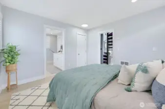 Main floor bedroom w/ closet & full bath