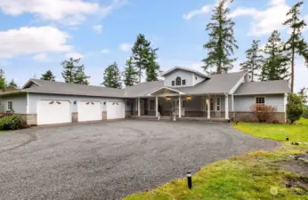 With a three car garage, you'll have room for your classics and ample space for hobbies.